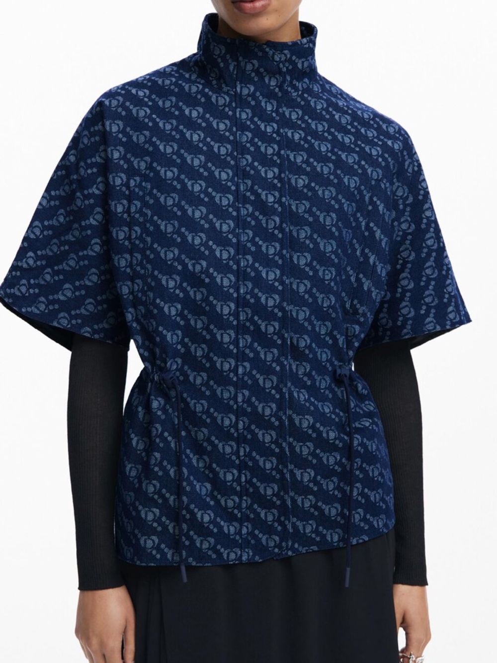DESIGUAL PONCHO WITH GEOMETRIC PATTERN PRINT
